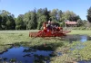 Retiran más de mil toneladas de lirio acuático de la Presa Azul en Huasca
