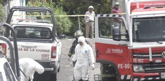 Hallan a dos personas sin vida en un terreno baldío en Tecali de Herrera