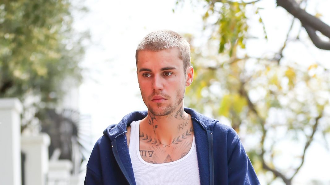 justin-bieber-arremete-furioso-paparazzi_98