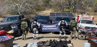 Guardia Nacional y Ejército aseguran arsenal y droga sintética en Huetamo, Michoacán Guardia Nacional y Ejército aseguran arsenal y droga sintética en Huetamo, Michoacán